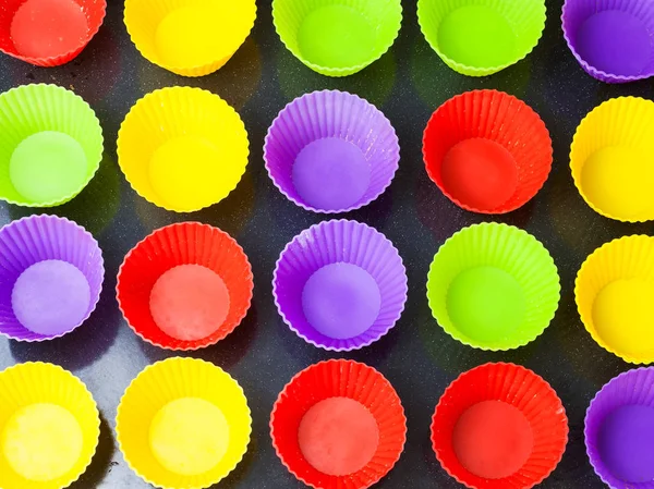 Vista Superior Muitos Moldes Silicone Multicoloridos Vazios Para Muffins Bandeja — Fotografia de Stock