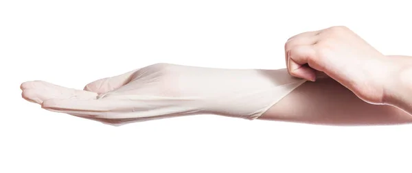 女性手的外形视图戴乳胶手套在另一只手隔离在白色背景 — 图库照片