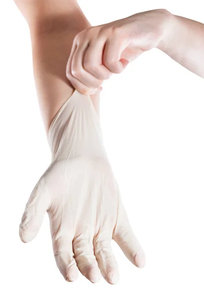 Vrouwelijke Hand Trekt Latex Handschoen Een Andere Hand Geïsoleerd Witte — Stockfoto