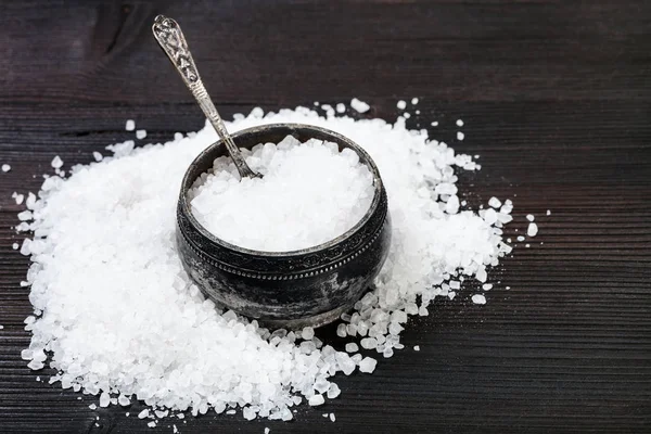 Silver salt cellar with coarse Sea Salt on table — Stock Photo, Image