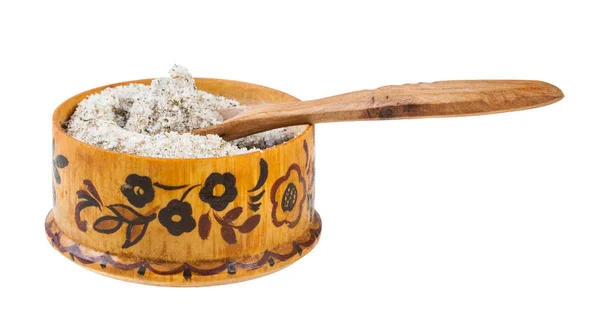 Wooden salt cellar with spoon with seasoned salt — Stock Image Wooden salt cellar with spoon with seasoned salt Stock Photo