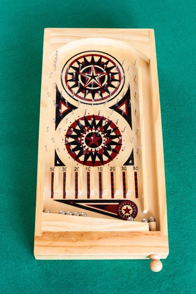 View of small wooden vintage pinball game on table — Stock Photo, Image