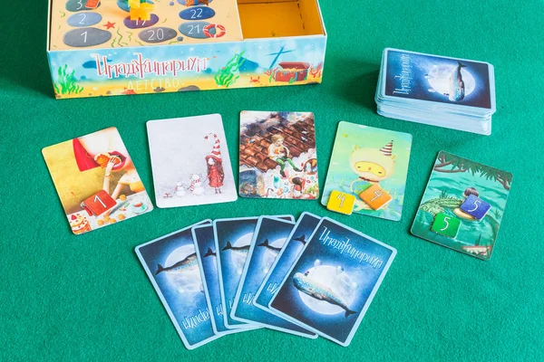 Imaginarium game items on green baize table — Stock Photo, Image