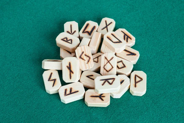 Pile of wooden tiles with fortunetelling runes — Stock Photo, Image