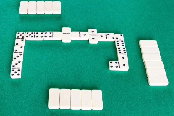 Playfield of dominoes board game with white tiles — Stock Photo, Image