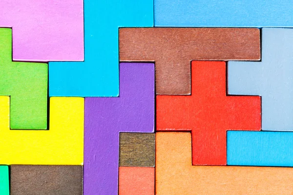 Top view of assembled puzzle from wood pentominoes — Stock Photo, Image