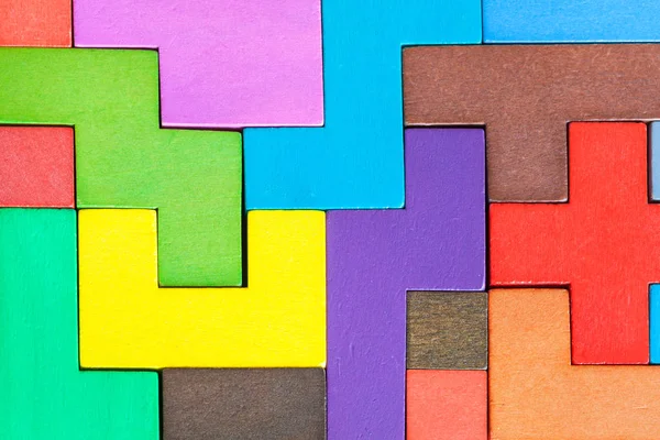 Sfondo da puzzle assemblato da blocchi di legno — Foto Stock