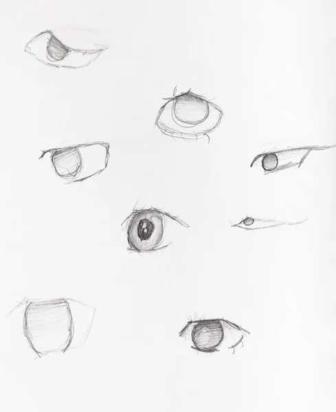 Эскизы человеческих глаз, нарисованные черным карандашом — стоковое фото