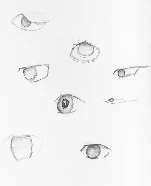 Sketches of human eyes hand drawn by black pencil — Stock Photo, Image