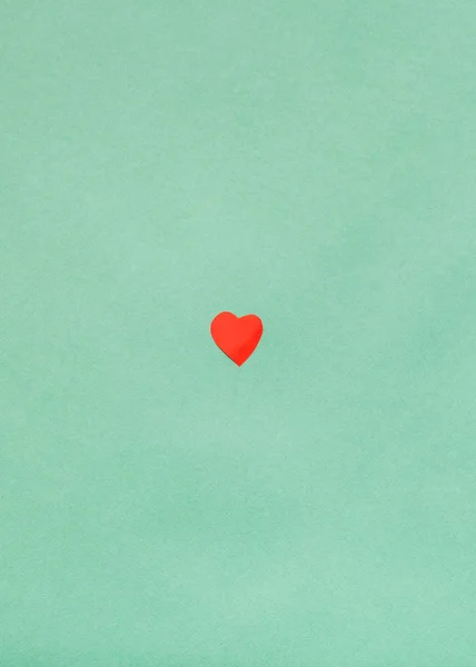 Red paper cut heart on Dark Sea Green paper — Stock Photo, Image