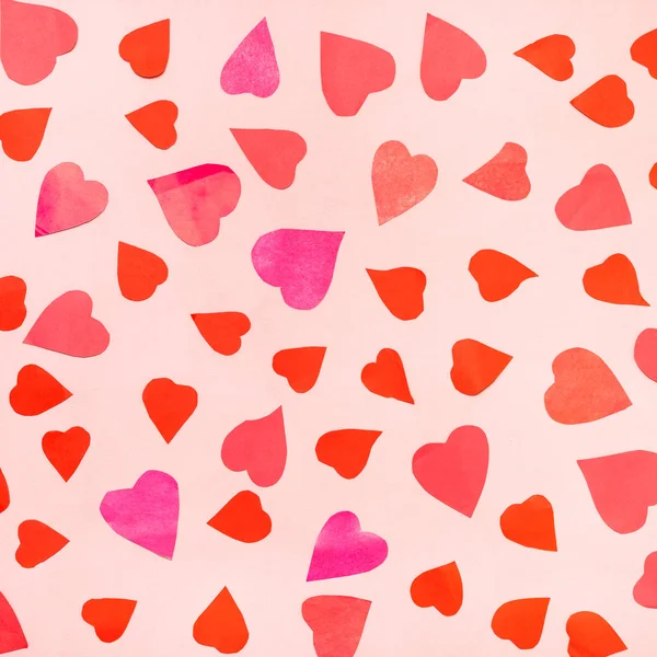 Collage of many hearts cut from pink and red paper — Stock Photo, Image