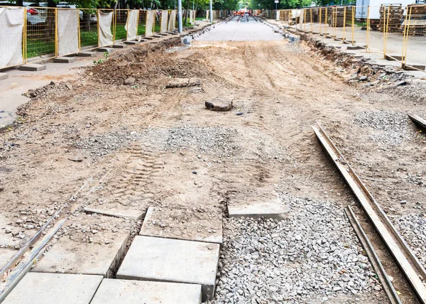 Broken old tram road and laying of new rails — Stock Photo, Image