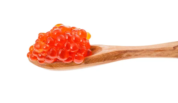 Side view of little wooden spoon with red caviar — Stock Photo, Image