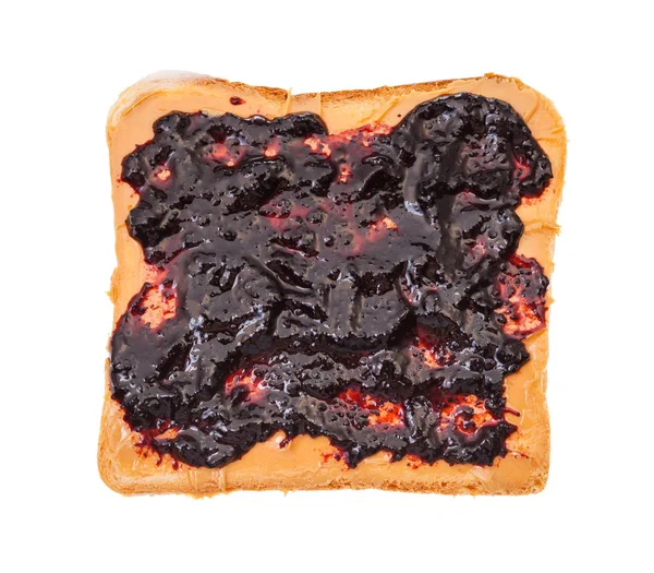 Открытый сэндвич с тостами, арахисовым маслом и джемом — стоковое фото
