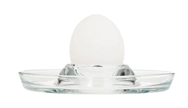 Side view of boiled egg in glass egg cup isolated — Stock Photo, Image