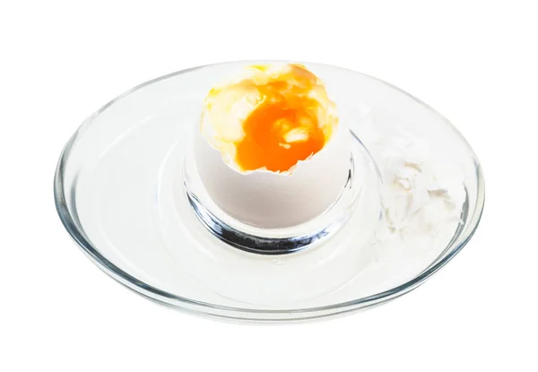 Open boiled white egg in glass egg cup isolated — Stock Photo, Image