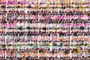 varicoloured woven yarns of boucle fabric close up clipart
