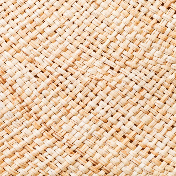 Texture of straw hat from interwoven raffia fibers — Stock Photo, Image