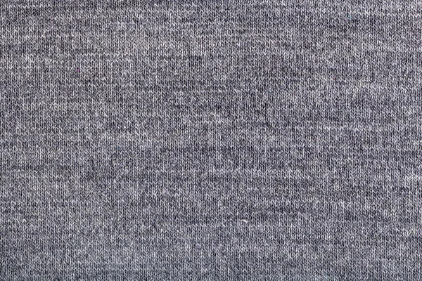 Woven yarns in gray jersey knitted fabric close up — Stock Photo, Image