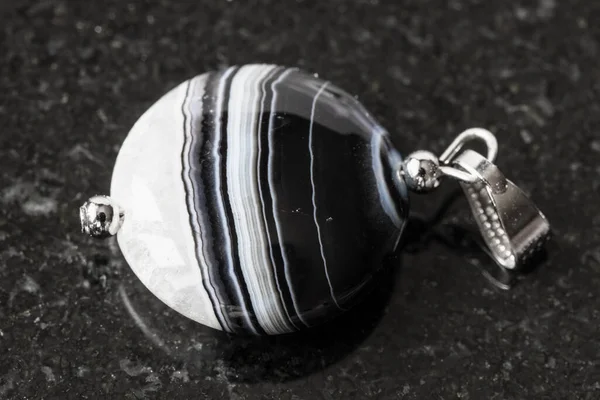 Pendant Striped Polished Agate Gemstone Black Granite Background — Stock Photo, Image