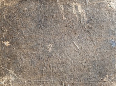 messy gray surface of retro cardboard card close up