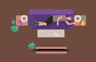 Genç adam üzerinde oturma TV izlerken