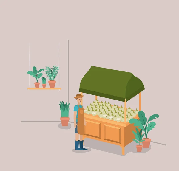 Man met planten vivarium in kiosk — Stockvector