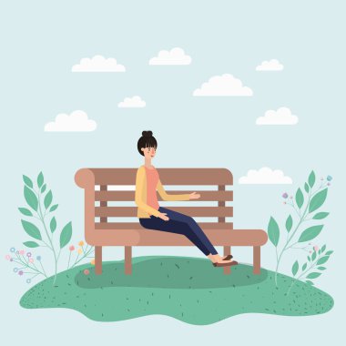 Park sandalyede oturan güzel kadın