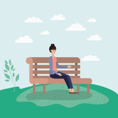 Park sandalyede oturan güzel kadın