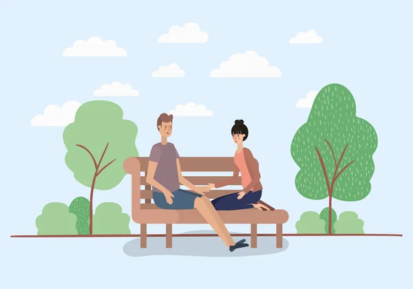 Mladá dvojice milenců sedí na židli park — Stockový vektor
