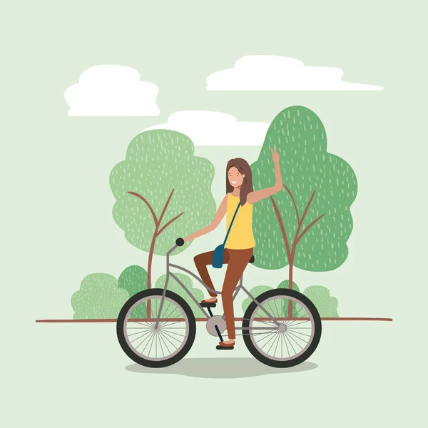 Молодая женщина на велосипеде в парке — стоковый вектор