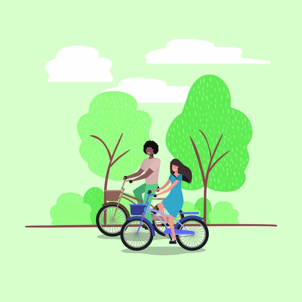 Pareja joven en bicicleta en el parque — Archivo Imágenes Vectoriales