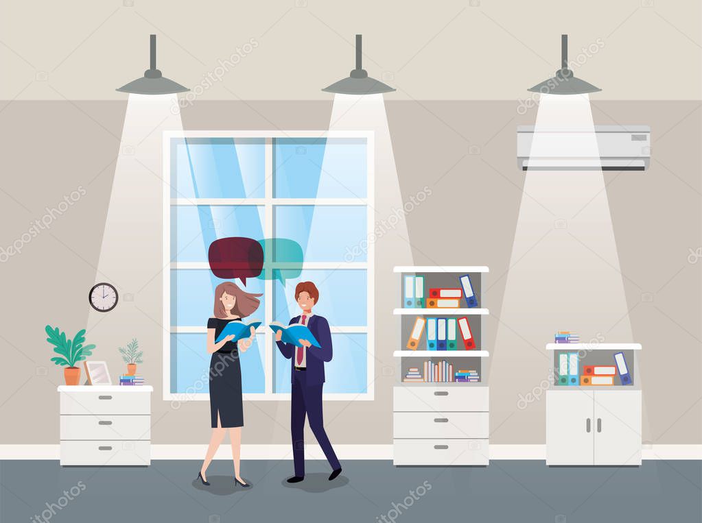 business couple talking in corridor office