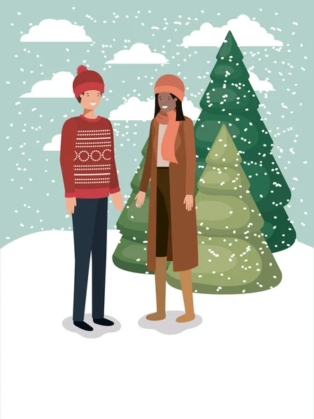冬の服と雪景色のカップル — ストックベクタ