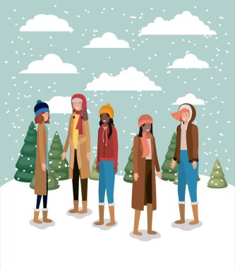 kadınların kış giysileri ile çimen Grup