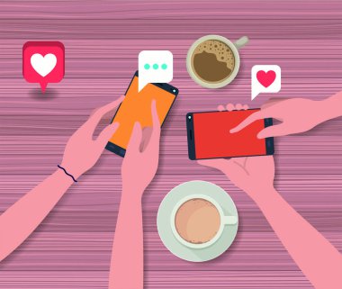 kahve fincanı ve sosyal simgeler ile akıllı telefon kullanan kişiler