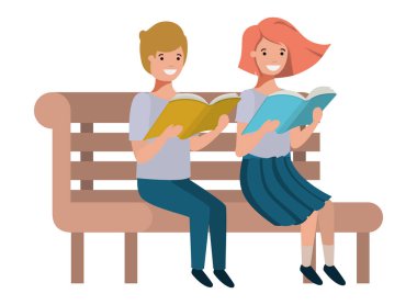 Genç öğrenciler oturmuş kitap okuyorlar.
