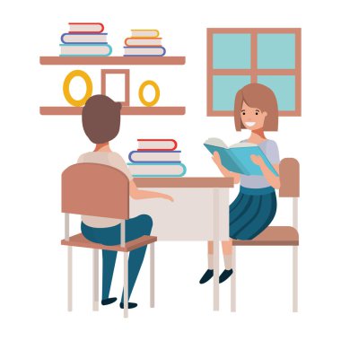 Genç öğrenciler okul masasında oturan