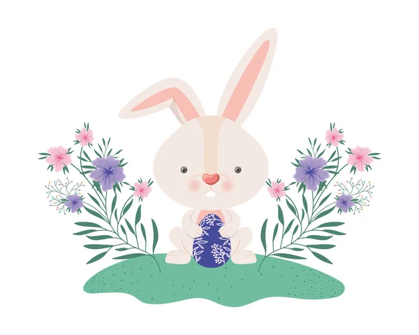 Easter bunny with flowers and easter eggs icon — Stock Vector