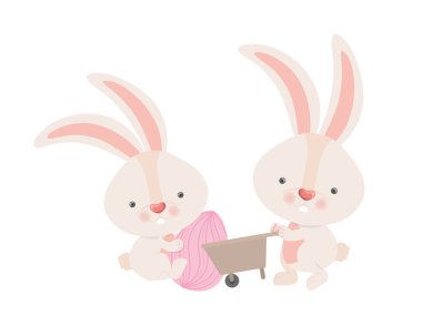 El arabası ve Paskalya yumurtası simgesi olan tavşanlar