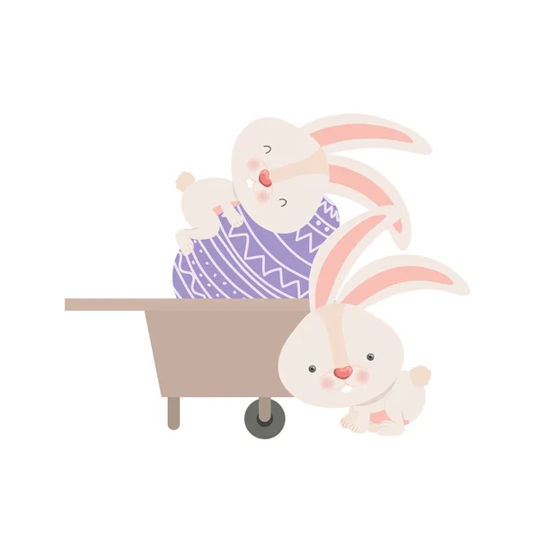 Lapins avec brouette et icône d'oeuf de Pâques — Image vectorielle