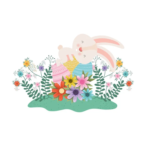 Easter rabbit with eggs and flowers icon — Stock Vector