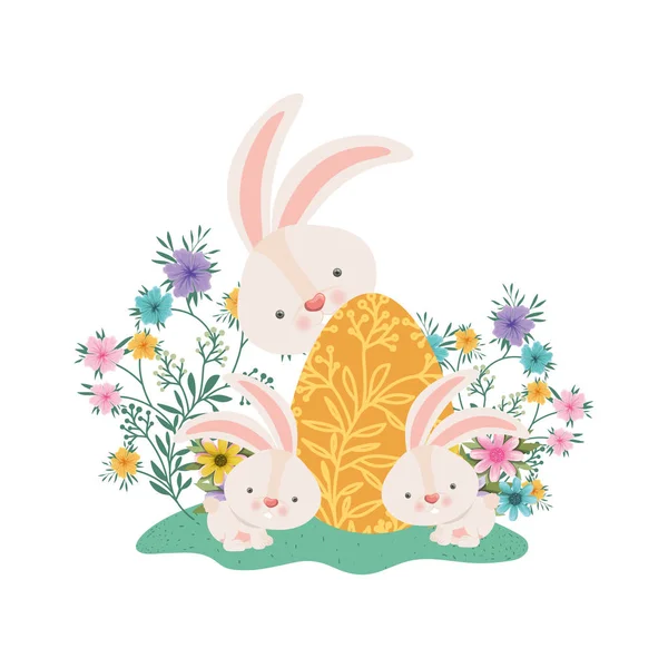 Conejos de Pascua con huevo y flores icono — Archivo Imágenes Vectoriales