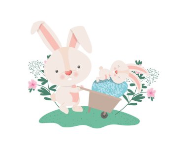 El arabası ve Paskalya yumurtası simgesi olan tavşan