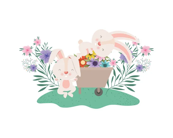 Bunnies with wheelbarrow and flowers isolated icon — Stock Vector