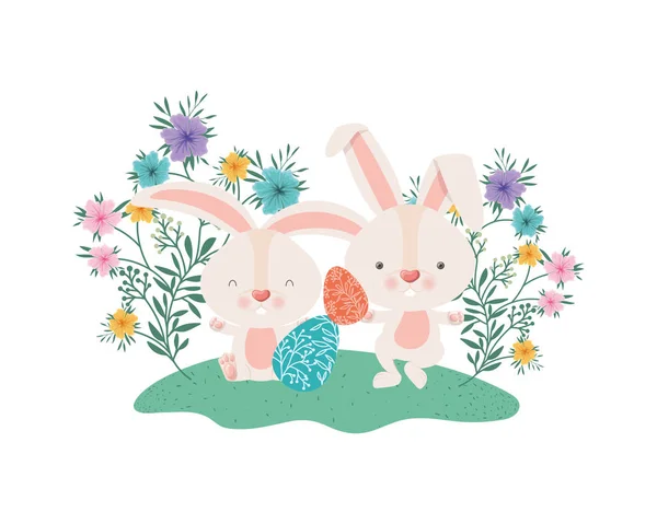 Conejos de Pascua con huevos y flores icono — Archivo Imágenes Vectoriales