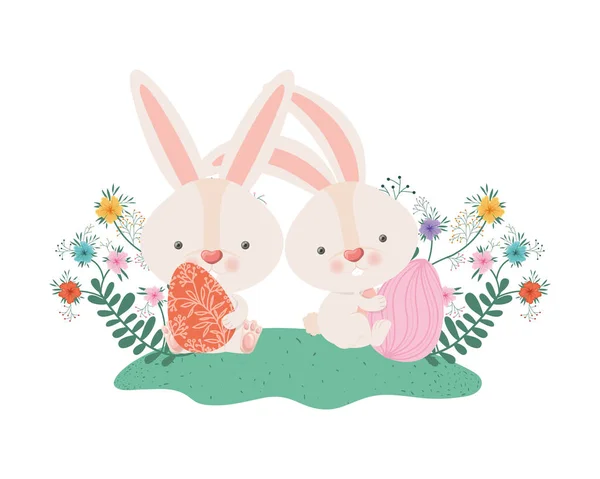 Easter rabbits with eggs and flowers icon — Stock Vector