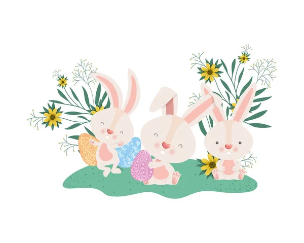 Pasen konijnen met eieren en bloemen pictogram — Stockvector