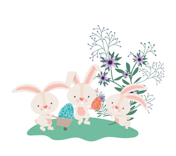 Conejos con carretilla y huevo de Pascua icono — Vector de stock