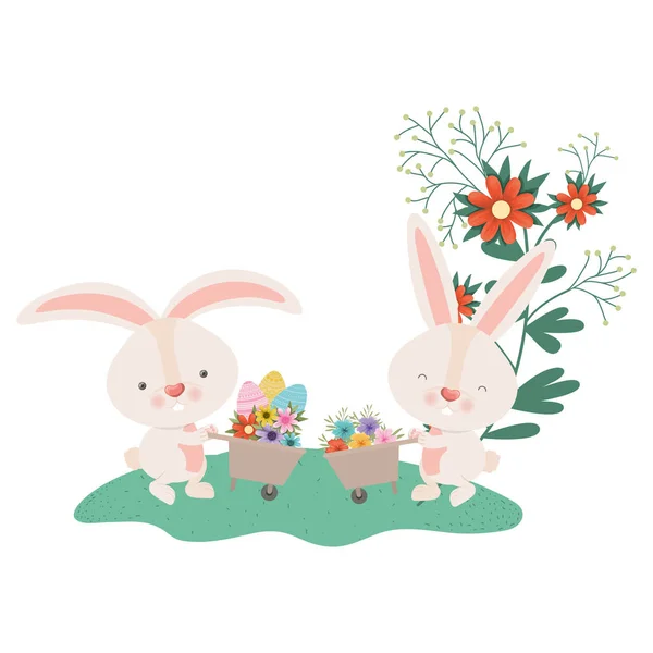 Rabbits with wheelbarrow and easter egg icon — Stock Vector